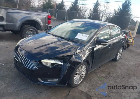 2017 Ford Focus Titanium from USA, damaged, VIN 1FADP3J20HL287340